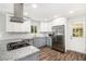 Kitchen with granite countertops, stainless steel appliances and white subway tile backsplash at 46 Cooper Lake Sw Rd, Mableton, GA 30126