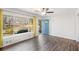 Bright living room with hardwood floors, large window and light-blue door at 46 Cooper Lake Sw Rd, Mableton, GA 30126