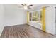 Living room with hardwood floors, ceiling fan, and large window view at 46 Cooper Lake Sw Rd, Mableton, GA 30126