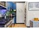 Galley kitchen featuring stainless steel appliances, green subway tile backsplash, and blue cabinets at 794 Ralph Mcgill Ne Blvd # 14, Atlanta, GA 30312