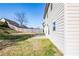 Spacious backyard featuring a lawn and a wooden fence at 2436 Planters Mill Way, Conyers, GA 30012