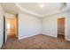 Bedroom with neutral colored walls, carpet floor, and a walk-in closet at 2436 Planters Mill Way, Conyers, GA 30012