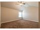 Bedroom featuring vaulted ceiling, a ceiling fan and carpeted flooring at 2436 Planters Mill Way, Conyers, GA 30012