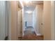 Carpeted hallway with doorways leading to various rooms at 2436 Planters Mill Way, Conyers, GA 30012