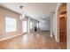 Bright living room featuring a fireplace, neutral paint, and modern light fixture at 2436 Planters Mill Way, Conyers, GA 30012