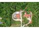 Bird's eye view showcases the secluded property with spacious grounds and mature trees at 2585 Braselton Hwy, Buford, GA 30519