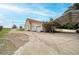 Spacious detached garage with an attached awning to protect your vehicles from the elements at 2585 Braselton Hwy, Buford, GA 30519