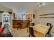 View of a dining area with a modern rustic kitchen bar and decorative shelving at 832 Chalet Hls, Mcdonough, GA 30253