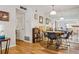 Dining area featuring wood floors and seating for four at 104 River Run Dr, Atlanta, GA 30350