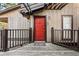 Exterior shot showing a red front door and a 'hello' welcome mat at 104 River Run Dr, Atlanta, GA 30350