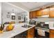 Traditional kitchen features wood cabinets, stainless appliances, and a functional layout at 104 River Run Dr, Atlanta, GA 30350