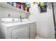 Convenient laundry room with a washer and dryer at 104 River Run Dr, Atlanta, GA 30350