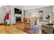 Comfortable living room with a fireplace, neutral furniture and wood floors at 104 River Run Dr, Atlanta, GA 30350