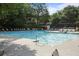 Large community pool featuring ample seating, a kiddie pool, and lots of space for residents to relax and enjoy at 117 Lablanc Nw Way, Atlanta, GA 30327