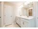 Elegant bathroom with double sinks, stone counters, and ample cabinet space at 1604 Ruskin Way, Marietta, GA 30062