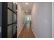 Inviting hallway with hardwood floors leads into a bright and airy living space at 1604 Ruskin Way, Marietta, GA 30062
