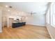 Open concept living space featuring hardwood floors, recessed lighting and modern ceiling fan at 1604 Ruskin Way, Marietta, GA 30062