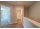 Bright hallway with modern flooring and access to multiple rooms at 1612 Ruskin Way, Marietta, GA 30062