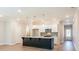 Modern kitchen featuring stainless steel appliances, a stylish island, pendant lighting, and sleek countertops at 1612 Ruskin Way, Marietta, GA 30062