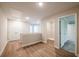 Spacious loft with wood floors and natural light, with doors leading to other rooms at 1612 Ruskin Way, Marietta, GA 30062