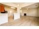 Open living space with fireplace, wood floors, and access to kitchen at 1670 Granville Ct, Lawrenceville, GA 30043