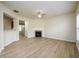 Spacious living room with fireplace and modern flooring at 1670 Granville Ct, Lawrenceville, GA 30043