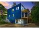Modern home boasts a unique architectural design, deck, and partially covered patio at 237 Altoona Sw Pl, Atlanta, GA 30314