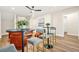 Contemporary living room featuring bar table, chairs, and modern decorations at 237 Altoona Sw Pl, Atlanta, GA 30314
