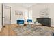 Inviting living room showcasing hardwood floors, stylish decor, and a comfortable seating arrangement at 237 Altoona Sw Pl, Atlanta, GA 30314
