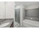 Bathroom features a granite countertop, soaking tub and glass enclosed shower at 250 Pharr Ne Rd # 318, Atlanta, GA 30305