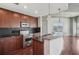 Modern kitchen features a breakfast bar, stainless steel appliances, and pendant lighting at 250 Pharr Ne Rd # 318, Atlanta, GA 30305