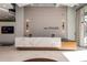 Inviting lobby area with a sleek marble reception desk, modern lighting, and elegant finishes at 250 Pharr Ne Rd # 318, Atlanta, GA 30305