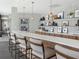 Modern lounge area with bar seating, stylish decor, and patterned backsplash at 250 Pharr Ne Rd # 318, Atlanta, GA 30305