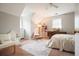 Bright bedroom with an easel, artwork, sitting area, and neutral decor create a calming and inviting atmosphere at 345 Lambeth Dr, Hiram, GA 30141