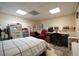 Large bedroom featuring a bed, multiple storage areas, and space for a working desk at 345 Lambeth Dr, Hiram, GA 30141
