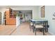 Bright dining area with tile floors seamlessly connects to the kitchen and living room at 345 Lambeth Dr, Hiram, GA 30141