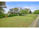 Lovely home with a spacious front yard, neat hedges, and charming curb appeal at 345 Lambeth Dr, Hiram, GA 30141