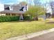 Charming two-story home featuring a well-maintained lawn and lush green hedges at 345 Lambeth Dr, Hiram, GA 30141