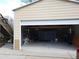 Side view of a large garage with loft and storage, offering ample room for vehicles and projects at 345 Lambeth Dr, Hiram, GA 30141