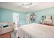 Charming main bedroom with a bed, sitting area, and an ensuite bathroom at 345 Lambeth Dr, Hiram, GA 30141