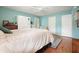 Large main bedroom with ensuite, and a bright blue wall color at 345 Lambeth Dr, Hiram, GA 30141