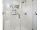 Bright and airy bathroom shower with glass door and tiled surround at 345 Lambeth Dr, Hiram, GA 30141