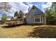 Spacious backyard with a wooden deck, perfect for outdoor living and entertainment at 5 Coventry Close, Avondale Estates, GA 30002