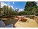 Outdoor deck with colorful chairs surrounding a dining table, perfect for entertaining at 5 Coventry Close, Avondale Estates, GA 30002