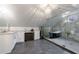 Elegant bathroom with marble shower, freestanding tub, and chic chandelier at 5 Coventry Close, Avondale Estates, GA 30002
