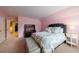 Spacious bedroom with a queen bed, a dark dresser, nightstand, and carpeted flooring at 5 Coventry Close, Avondale Estates, GA 30002