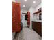 Walk-in closet with custom wood storage system at 5 Coventry Close, Avondale Estates, GA 30002