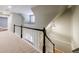 Stairwell features stairs with railing, pendant light, and natural light from window at 5 Coventry Close, Avondale Estates, GA 30002
