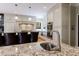 Open kitchen boasts an island, stainless steel appliances, and custom cabinetry at 5 Coventry Close, Avondale Estates, GA 30002