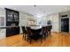 Spacious kitchen with a central island, seating, stainless steel appliances, and custom cabinetry at 5 Coventry Close, Avondale Estates, GA 30002